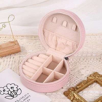 Kaasaskantav ümmargune ehtekarp Kaelakeed Kõrvarõngad Sõrmused Ehted Korraldaja Näidik Reisi ehtekarbid Pu-nahast hoiukarp