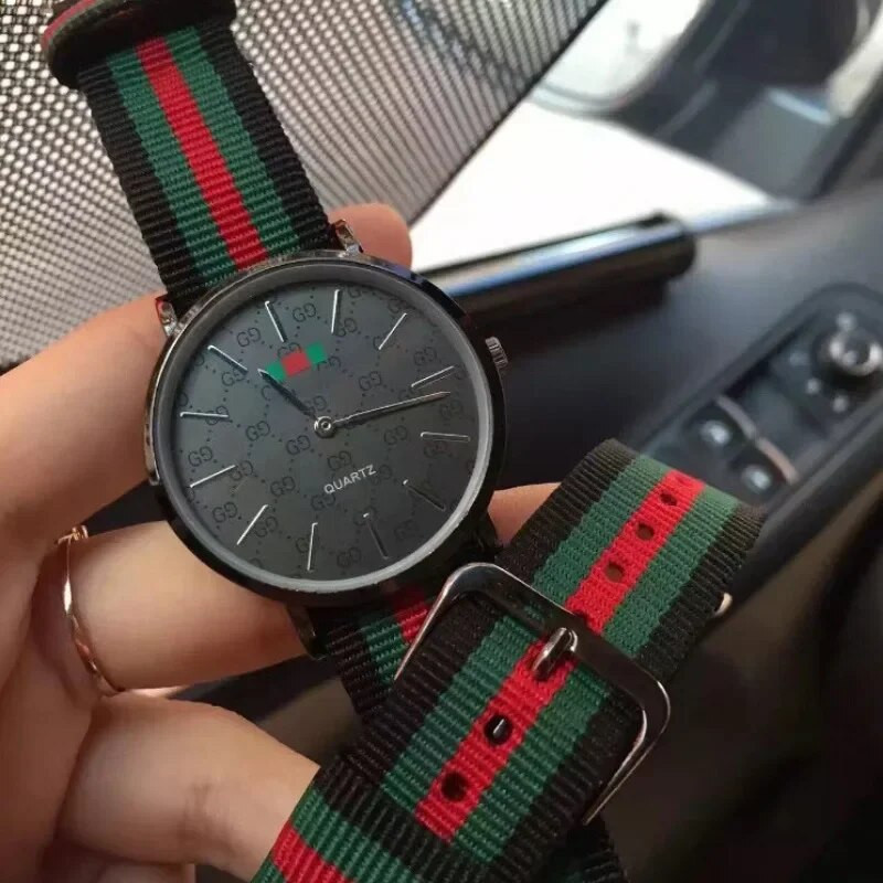 Luksuslik nailonist rihm stiilse vabaaja trendiga paarikellaga, isikupärastatud mitmekülgne üliõhuke meeste ja naiste tudengikell