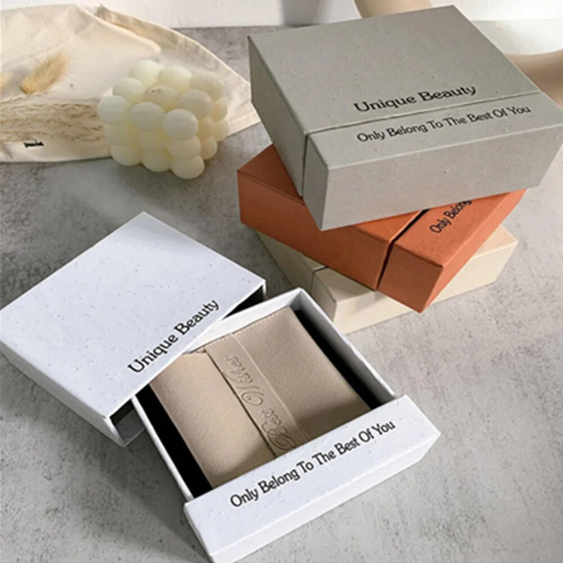 Jauna atvilktņu dārglietu kastīte ar PE membrānas balstiekārtu gredzeniem auskariem rokassprādzes kaklarota ar bruņu glabāšanas organizatora kastīti