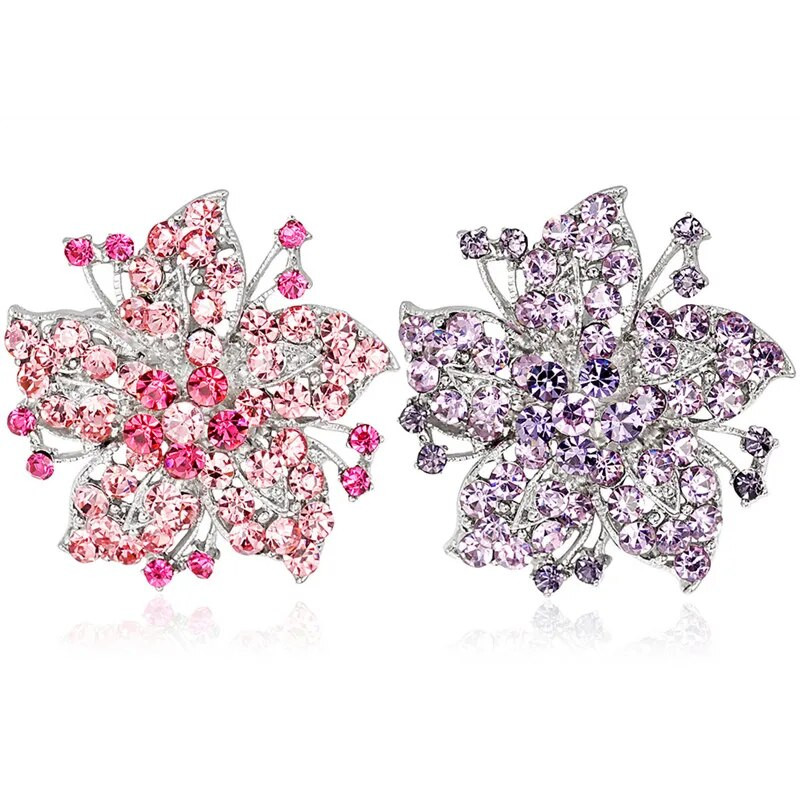 Suured sädelevad kristallist kividest lillelised prossinõelad väliskandmiseks või pulmadeks