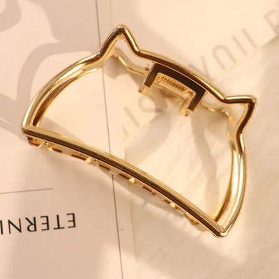 Mood naiste õõnsad geomeetrilised juukseklambrid metallist juuksenõelaga ristjuuksenõelaga peapael Libisematu juuksekrabi kullavärvi juukseaksessuaarid