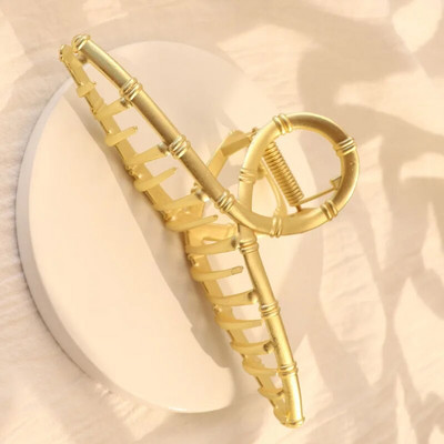 Mood naiste õõnsad geomeetrilised juukseklambrid metallist juuksenõelaga ristjuuksenõelaga peapael Libisematu juuksekrabi kullavärvi juukseaksessuaarid