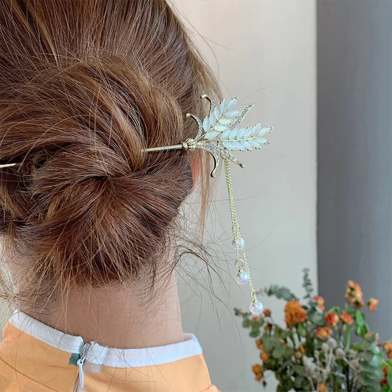 Uued lihtsad ja elegantsed tutid Advanced Sense'iga Uue Hiina stiilis nisukõrva juuksenõel naiste seljapea juuste aksessuaarid