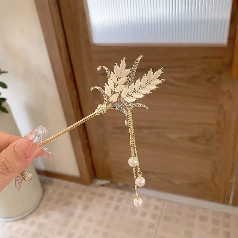 Uued lihtsad ja elegantsed tutid Advanced Sense'iga Uue Hiina stiilis nisukõrva juuksenõel naiste seljapea juuste aksessuaarid