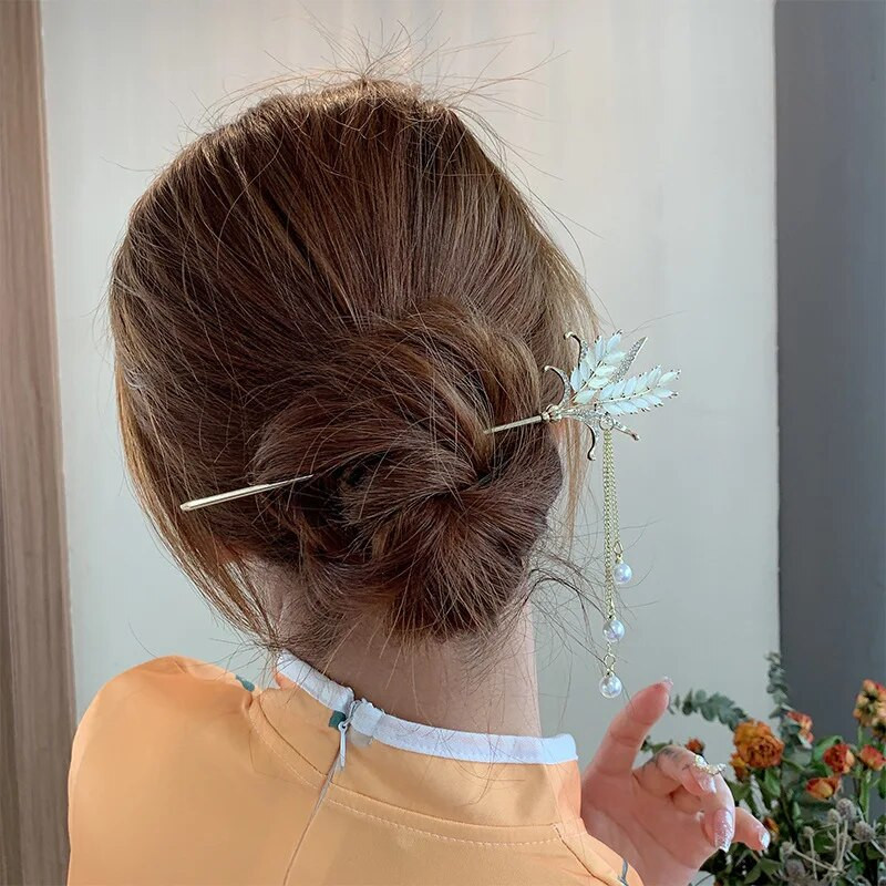 Uued lihtsad ja elegantsed tutid Advanced Sense'iga Uue Hiina stiilis nisukõrva juuksenõel naiste seljapea juuste aksessuaarid