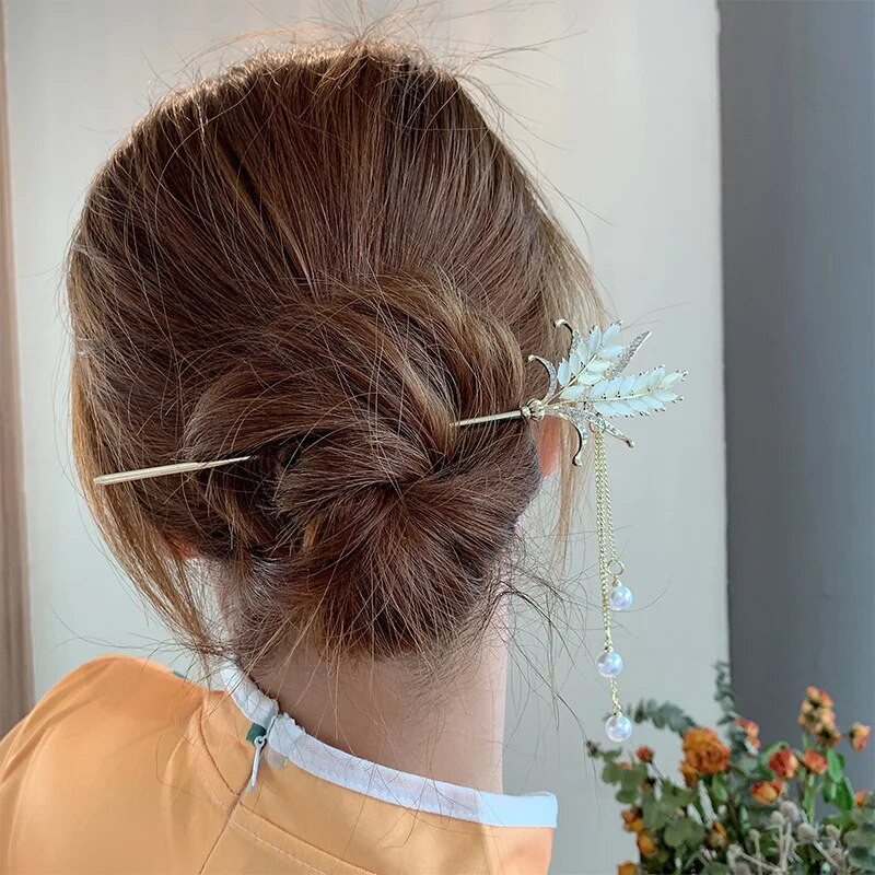 Uued lihtsad ja elegantsed tutid Advanced Sense'iga Uue Hiina stiilis nisukõrva juuksenõel naiste seljapea juuste aksessuaarid