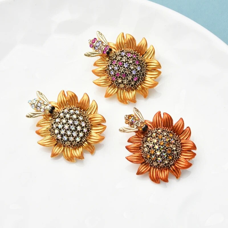 Wuli&baby Rhinestone bišu un saulespuķu saktas sievietēm Sieviešu 3 krāsu emaljas ziedu ballītei ikdienas saktas piespraudes dāvanas