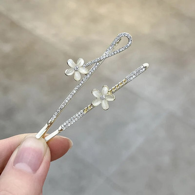 Uus Korea versioon pärlilillest tsirkoonist üherealine juukseklamber kivist küljeklamber temperament naiste mood juukseaksessuaarid