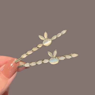 Uus Korea versioon pärlilillest tsirkoonist üherealine juukseklamber kivist küljeklamber temperament naiste mood juukseaksessuaarid