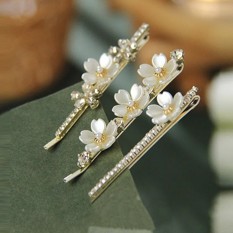 Uus Korea versioon pärlilillest tsirkoonist üherealine juukseklamber kivist küljeklamber temperament naiste mood juukseaksessuaarid