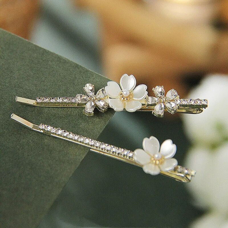 Uus Korea versioon pärlilillest tsirkoonist üherealine juukseklamber kivist küljeklamber temperament naiste mood juukseaksessuaarid