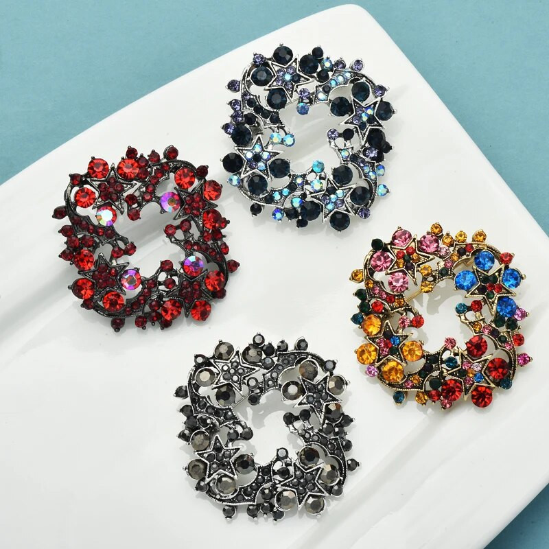 Wuli&baby Svjetlucavi vijenac Broševi s cvijećem za žene Unisex 4-bojni Ljepota Biljke Krug Novogodišnji broš Igle Pokloni