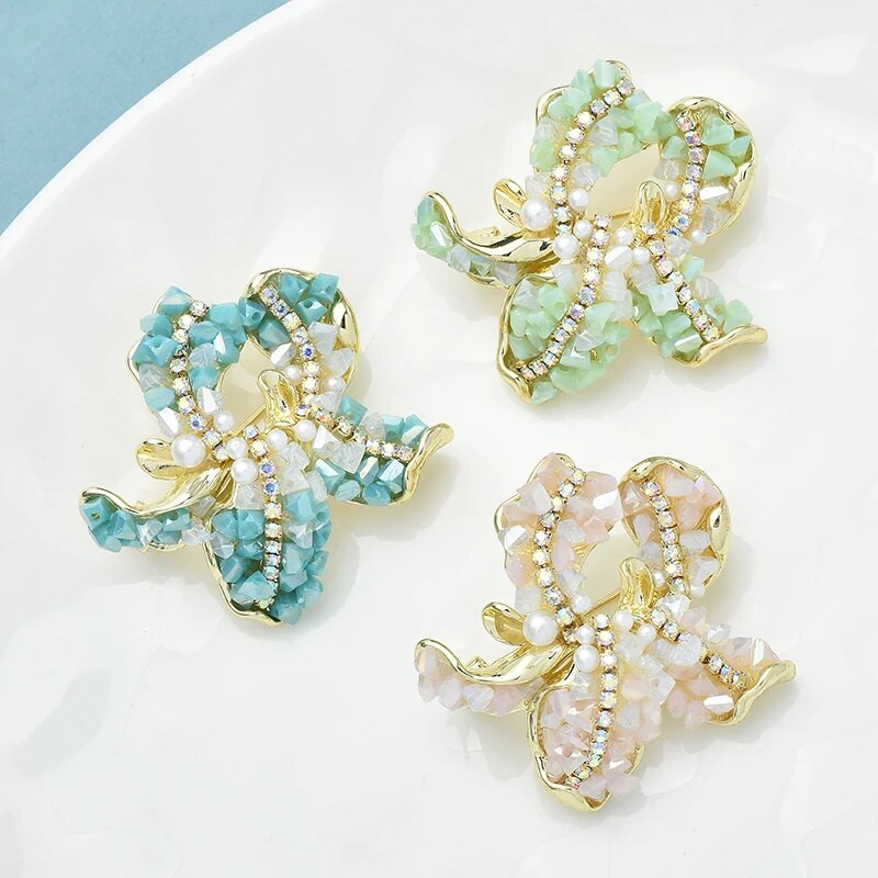 Wuli&baby käsitööna valmistatud orhidee lilleprossid naistele Unisex 3-värvilised kristallist kaunid taimed peokontori prossinõelad Kingitused