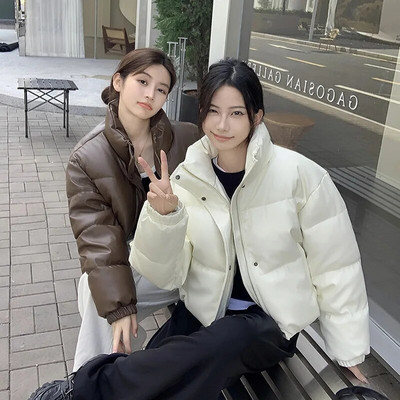 Nahast polsterdatud naiste külm paks lühike mantli aluskrae 2023. aasta talvine soliidne lahtine tõmblukuga nupp Naiste soe jope tänavariided