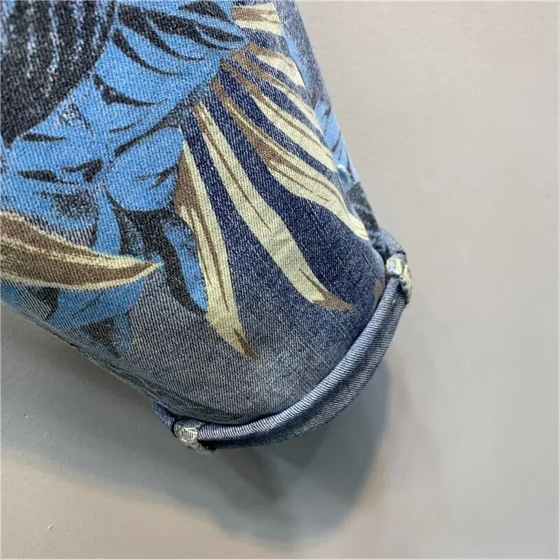 Euroopa 2023. aasta kevad uus vahtralehtede trükkimine, värvimine kärbitud teksad Naiste mood tänavarõivad kõrge vöökohaga lahtised haaremi teksapüksid