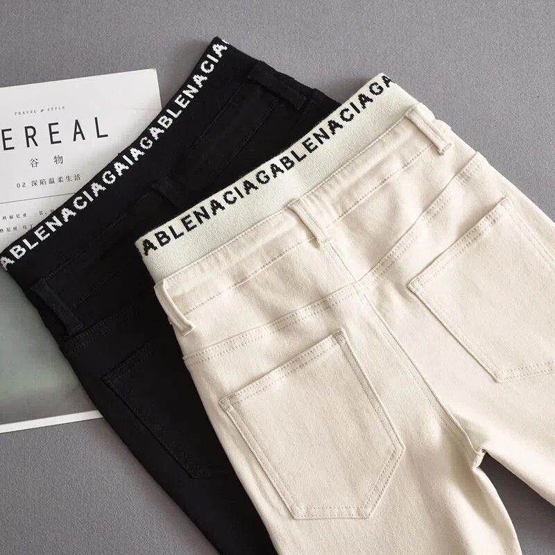 Moodsad kirjadisain kitsad teksad Naiste kõrge vöökohaga lapitööd Vaqueros vabaaja veniv pliiatspüksid kevadsuvi teksariidest säärised