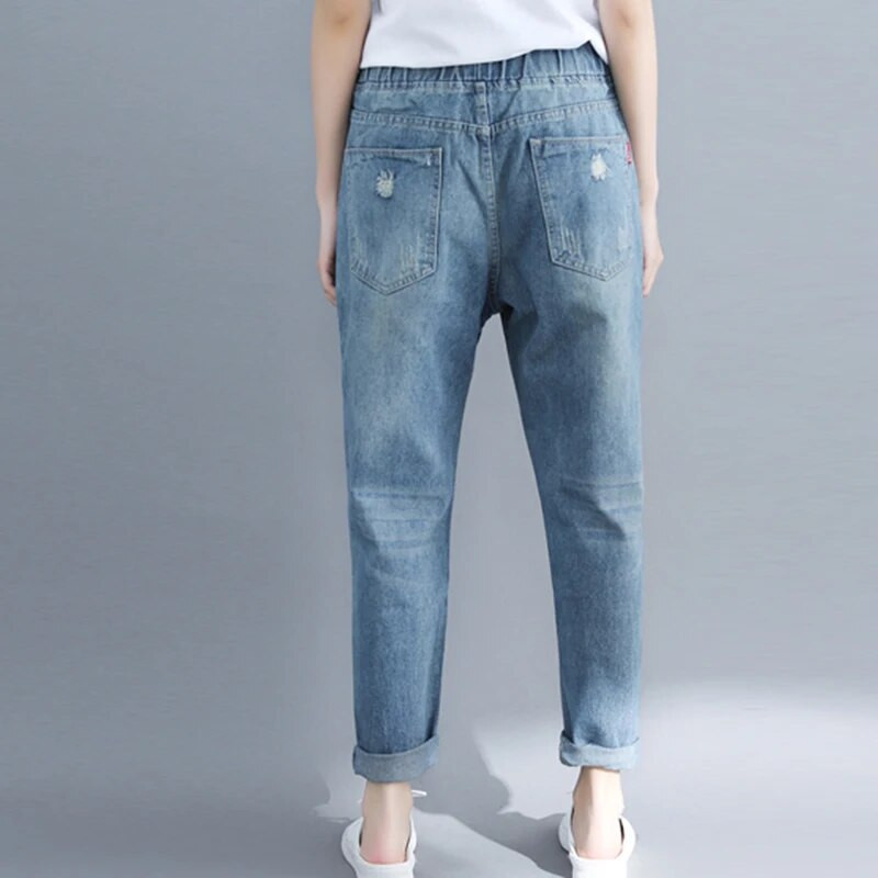 Plyšę skylutę džinsai Moteriški pavasario mados elastingas juosmuo vientisos spalvos vintažinės džinsinės kelnės Laisvos, universalios, kulkšnies ilgio kelnės