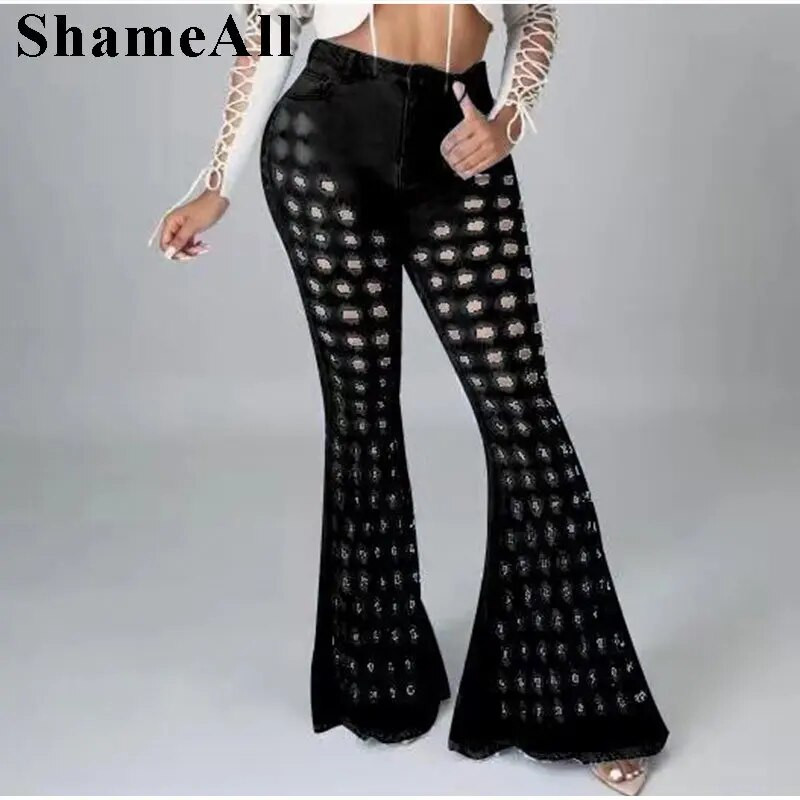 Y2K tänav valge sinine õõnes venivad lainelised teksad Seksikad klubi rebenenud augud laiad jalad lõhki, ülivenivad indie kellapõhjad