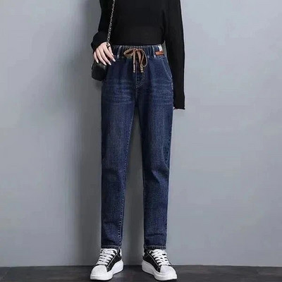 2023. aasta kevadised sügise uued elastsed puuvillased teksad Naiste vabad kõrge vöökohaga Hareni teksapüksid Naiste vabaaja Korea metsikud teksad