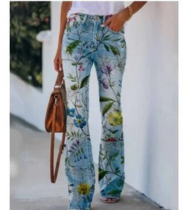 Naiste lillega trükitud kottis teksad, kõrge vöökohaga tänavarõivad, sirge laia säärega teksapüksid