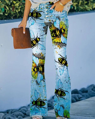 Naiste lillega trükitud kottis teksad, kõrge vöökohaga tänavarõivad, sirge laia säärega teksapüksid