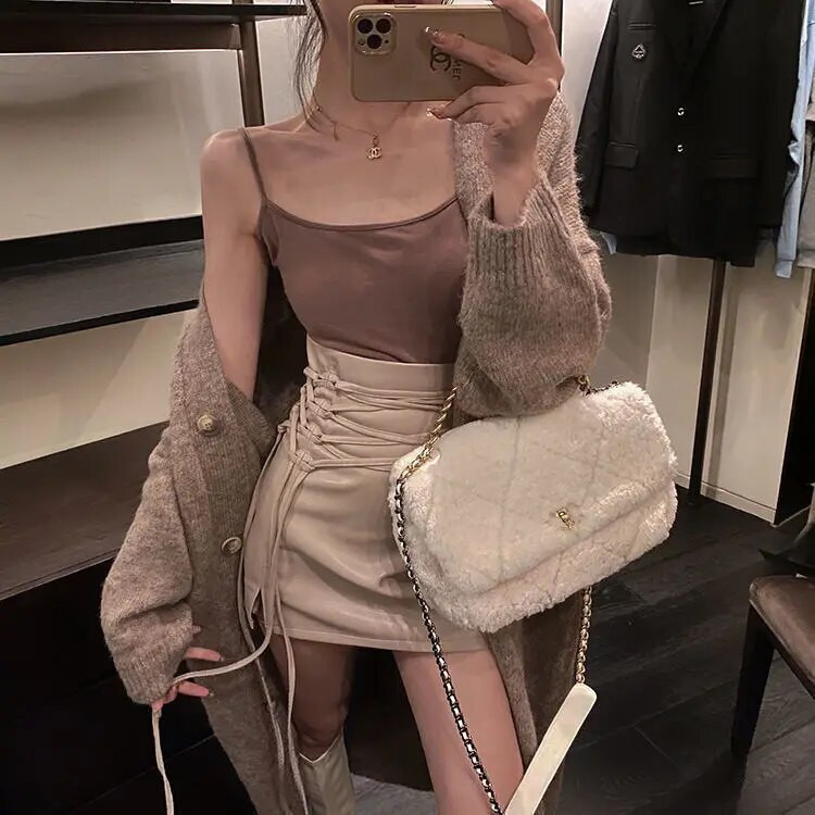 Modes sieviešu svārki pavasara rudens vienkrāsaini Sexy Clubwear Mini svārki ar augstu vidukli ar mežģīņu zīmuli krustveida svārki sievietēm