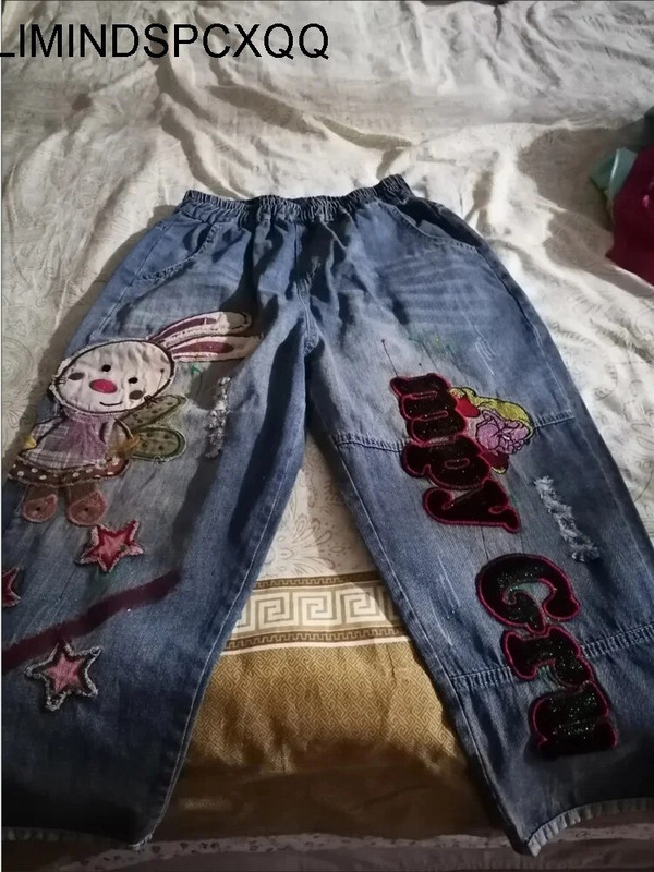 Tampriu juosmeniu, laisvos liekninančios haremo kelnės, moteriškos 2022 m. pavasario ir rudens triušio siuvinėjimas Vandeniu nuplautų skylučių tinkliniai džinsai moteriški