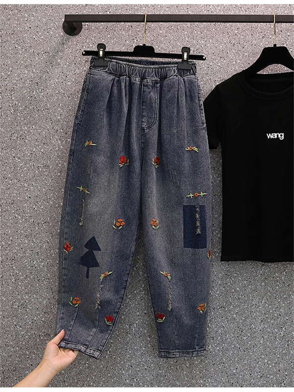 Kevadmood Naiste lilletikandid Värske stiiliga teksapüksid Naise elastne vöökoht Retro-rebitud teksad Vabaaja lahtised haaremipüksid