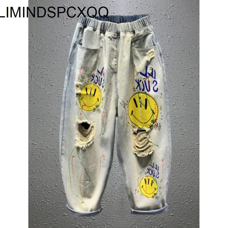 2023 m. pavasaris ir vasara Naujas animacinis filmas, plėšyti šviesiai mėlyni, laisvi džinsai, moteriški madingi elastiniai juosmuo, plačios kojos Haremo kelnės, moteriškos