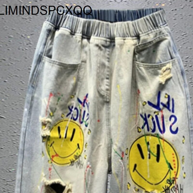 2023 m. pavasaris ir vasara Naujas animacinis filmas, plėšyti šviesiai mėlyni, laisvi džinsai, moteriški madingi elastiniai juosmuo, plačios kojos Haremo kelnės, moteriškos
