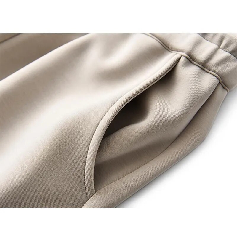 Rudens žiemos, aukšto elastingumo juosmens suvarstomos Kasdieninės mados sportinės kelnės Moteriškos, laisvos Haremo kelnės, moteriškos sportiškos kelnės