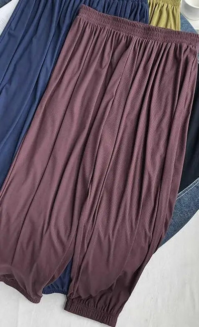 Suures suuruses 6XL 150KG suvised õhukesed püksid ühevärvilised laia säärega püksid kõrge elastsusega lahtised suured kodupüksid