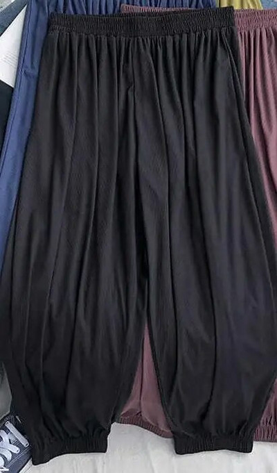 Suures suuruses 6XL 150KG suvised õhukesed püksid ühevärvilised laia säärega püksid kõrge elastsusega lahtised suured kodupüksid