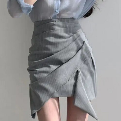 Naiste kõrge vöökohaga miniseelikud Uus kevadine asümmeetriline disain šikk kontoridaam Soliidne temperament Sobivad stiilsed populaarsed Faldad