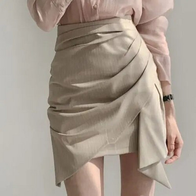 Naiste kõrge vöökohaga miniseelikud Uus kevadine asümmeetriline disain šikk kontoridaam Soliidne temperament Sobivad stiilsed populaarsed Faldad