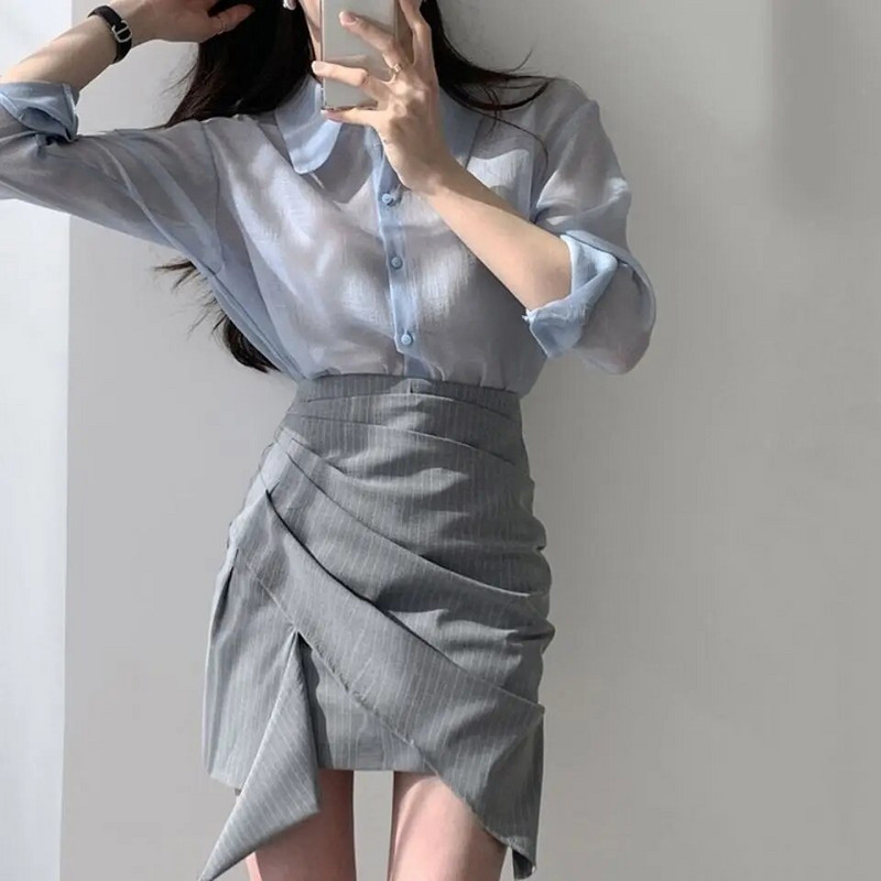 Naiste kõrge vöökohaga miniseelikud Uus kevadine asümmeetriline disain šikk kontoridaam Soliidne temperament Sobivad stiilsed populaarsed Faldad