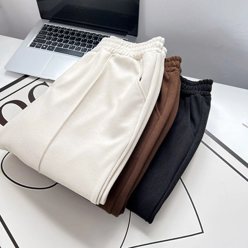 Rudenį/žiemą 100 kg Madingos storos aukšto juosmens vilnonės kostiuminės kelnės didelio dydžio moteriškos laisvalaikio asimetrinės kojos atidaromos apačios