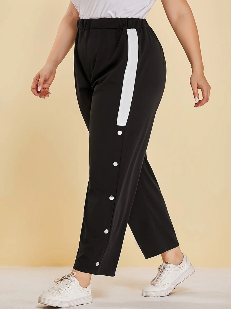 Kevad-suvised uued plusssuuruses tänavastiilis naiste nööpidesainiga tavalised splaissitud riidest vabaajapüksid