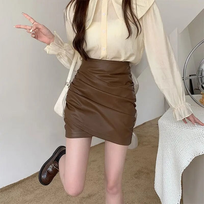 PU odinis mini sijonas moterims, nauja, 2023 m. mada korėjietiško stiliaus vintažinio klostuoto pagrindo moteriški sijonai aukštu juosmeniu P004