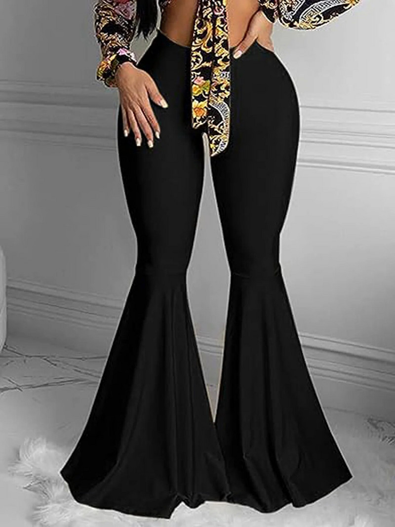 Kevadsuvised uued naiste pluss suuruses Briti High street stiilis drapeeringuga ühevärvilised lainetavad püksid