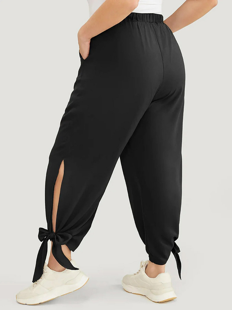 Naiste pluss-suuruses luksuslikud moe-stiilis lõhikuga püksid tasku disainiga Senior sense püksid üheksa punktiga püksid