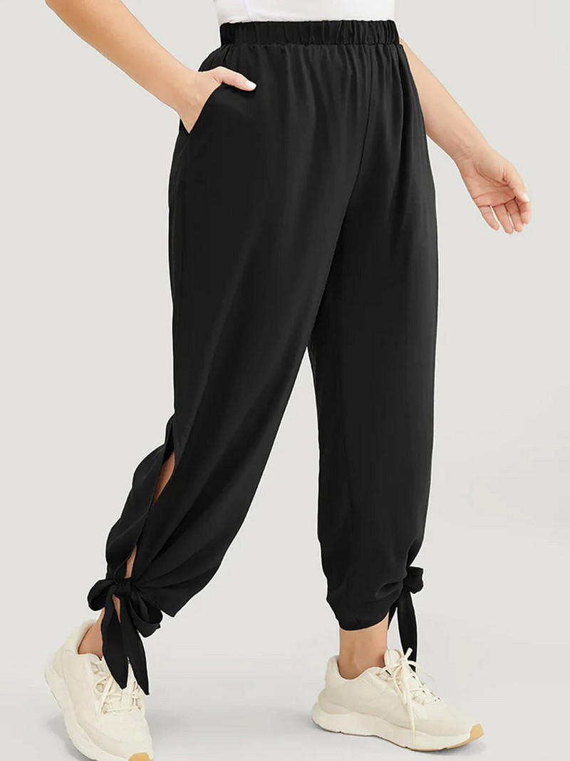 Naiste pluss-suuruses luksuslikud moe-stiilis lõhikuga püksid tasku disainiga Senior sense püksid üheksa punktiga püksid