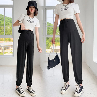 Καλοκαιρινό παντελόνι εγκυμοσύνης σιφόν μονόχρωμο βολάν με κορδόνι στρίφωμα τεντωμένο έγκυο παντελόνι κοιλιάς Φαρδύ παντελόνι εγκυμοσύνης