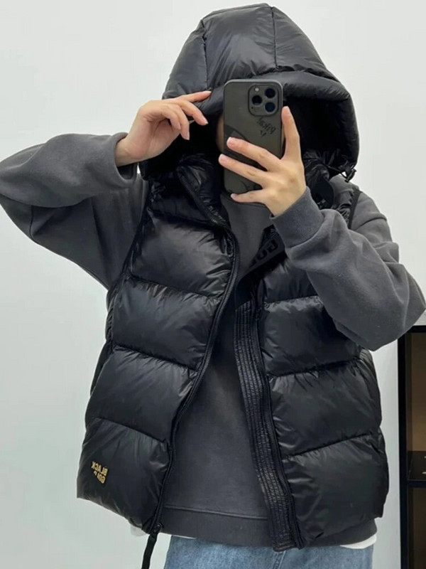 Kapuutsiga pardi sulejope naiste talvine paks soe varrukateta mantel Meeste must õhuke vest Mood vabaaja tuulekindel mantel