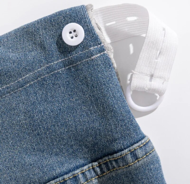 Nėščioms moterims suskirstytas džinsinis pussijonas, vidutinio ilgio moteriškas A formos sijonas, apvyniotas ant klubų