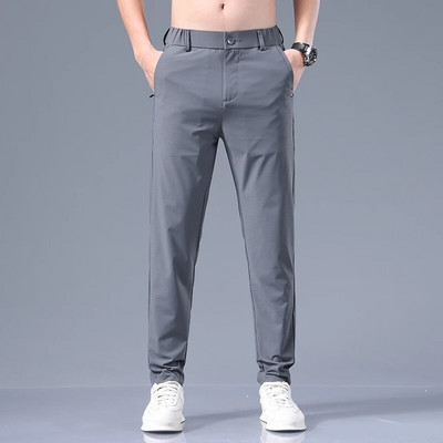 Vasarinės plonos vyriškos verslo plonos korėjietiškos laisvalaikio kelnės Klasikinio stiliaus vientisos spalvos Paprasti vyriški drabužiai Ledinės šilko kelnės 28-38