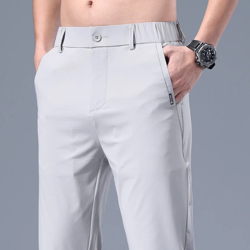 Vasarinės plonos vyriškos verslo plonos korėjietiškos laisvalaikio kelnės Klasikinio stiliaus vientisos spalvos Paprasti vyriški drabužiai Ledinės šilko kelnės 28-38