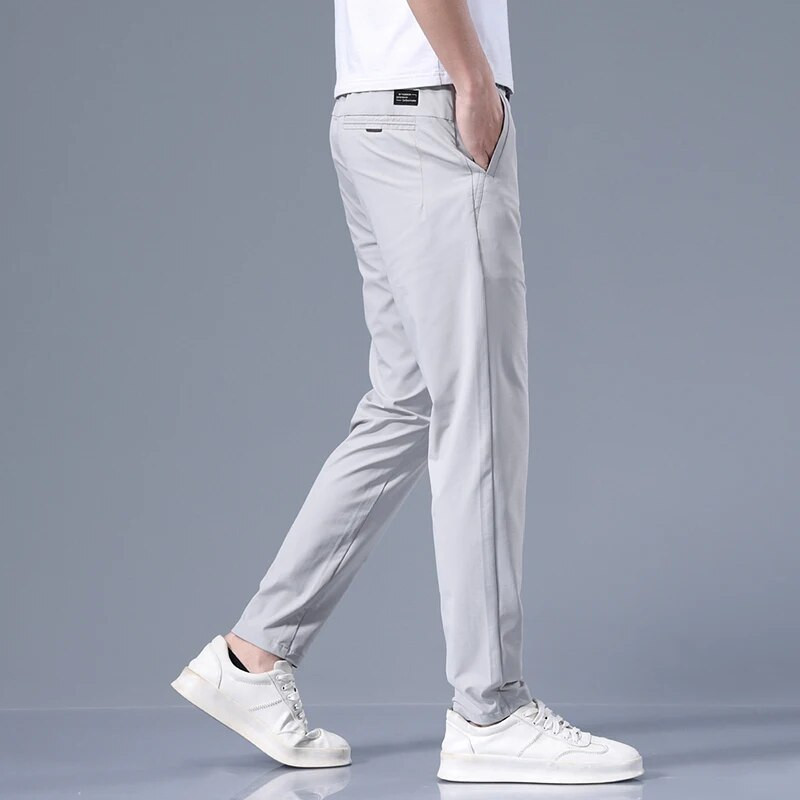 Vasarinės plonos vyriškos verslo plonos korėjietiškos laisvalaikio kelnės Klasikinio stiliaus vientisos spalvos Paprasti vyriški drabužiai Ledinės šilko kelnės 28-38