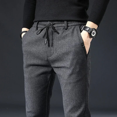 Φθινοπωρινό, χειμερινό βουρτσισμένο ύφασμα, καθημερινό παντελόνι ανδρικό χοντρό Επαγγελματικό κορδόνι ελαστικό στη μέση Λεπτό μαύρο παντελόνι Ανδρικό συν μέγεθος 38