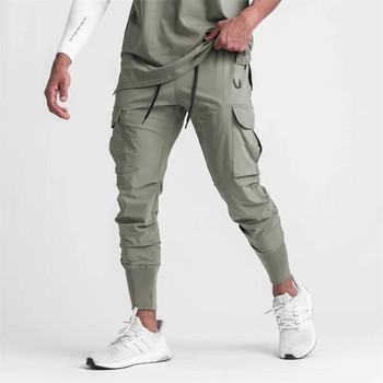 2022 Нови мъжки карго панталони Летни тънки свободни бързосъхнещи еластични клинове Тренировка за бягане Спортни панталони Ежедневни трендови панталони